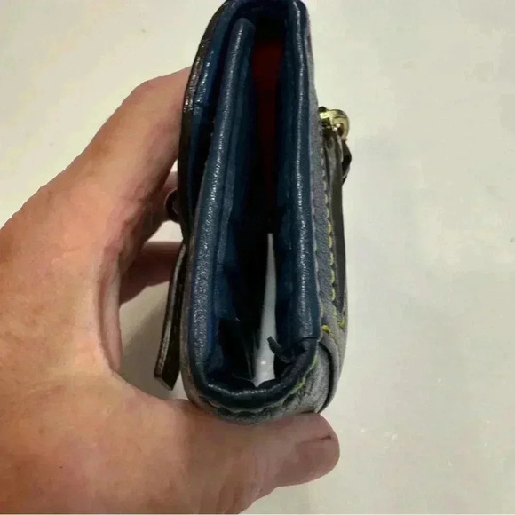 Navy blue pebble leather trifold wallet. Red interior. Perfect condition - Picture 4 of 10